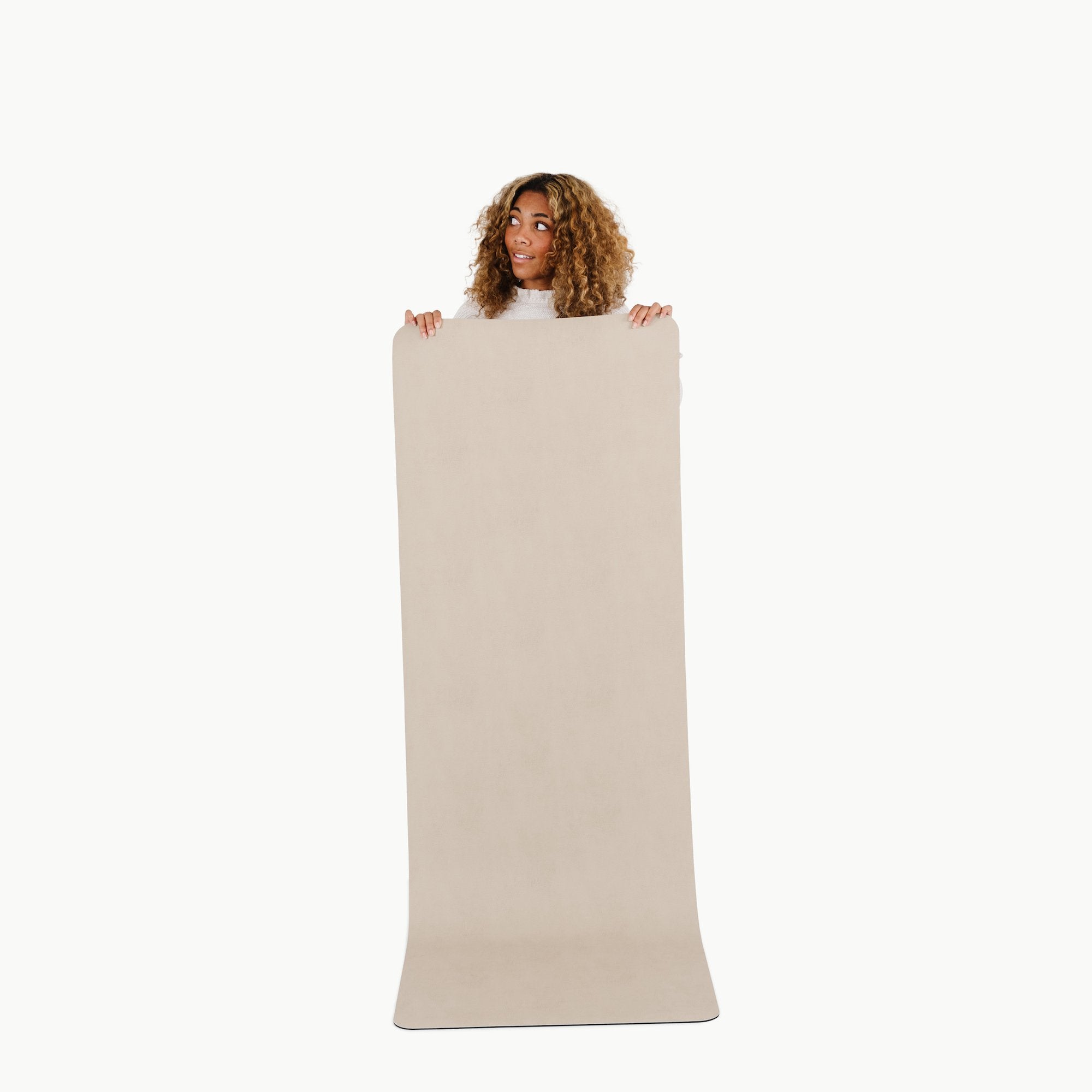 Fog (on sale)@woman holding up the large fog home mat
