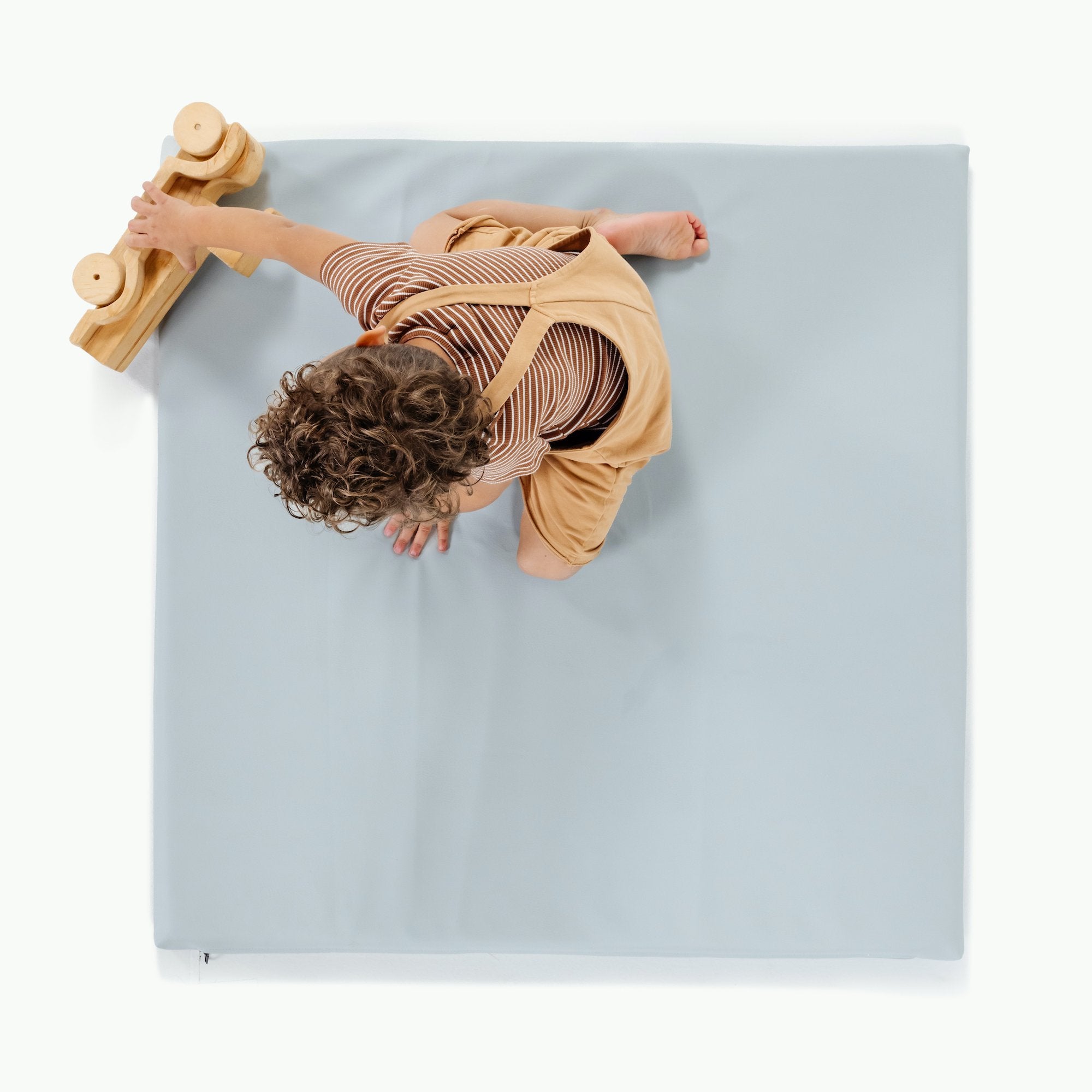 Dawn (on sale) / Square@overhead of boy playing on dawn padded mini