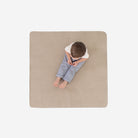 Fog (on sale)@Overhead of kid sitting on the Fog Mini Mat