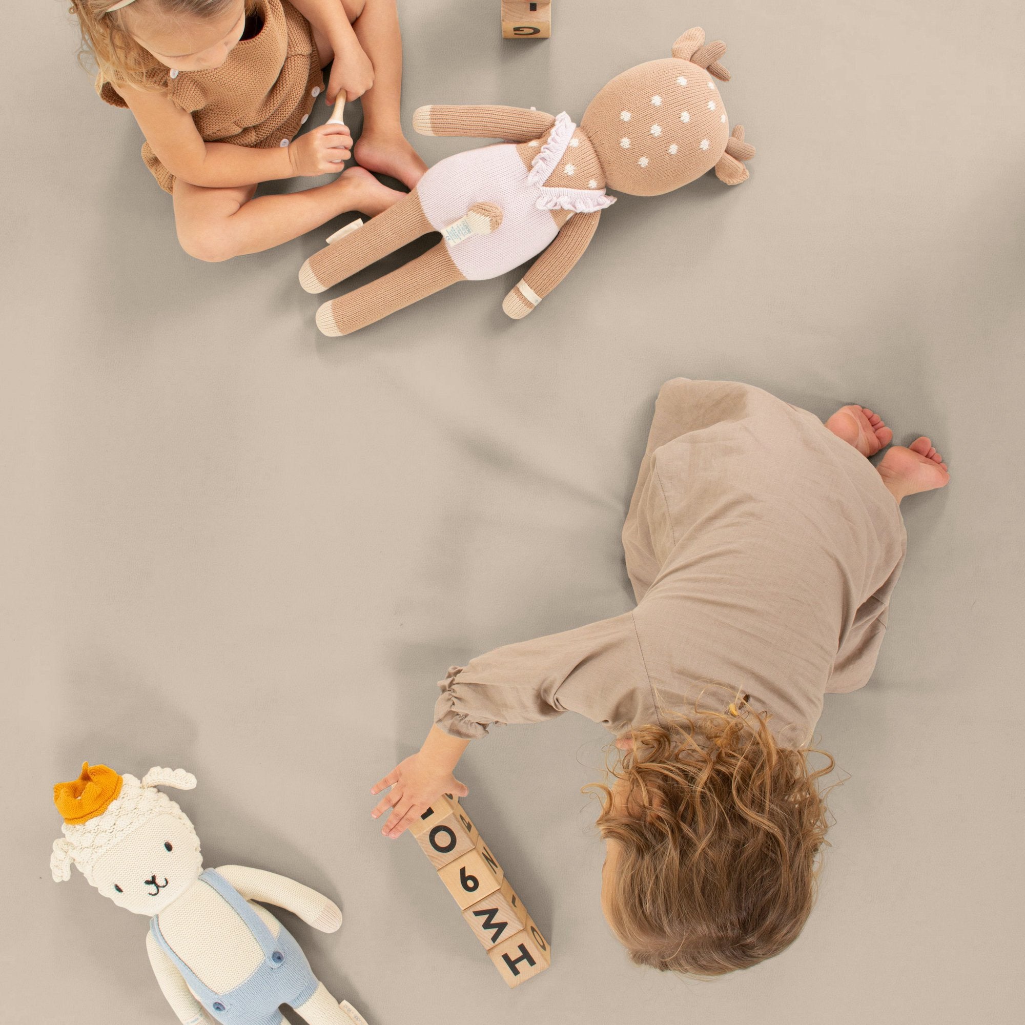 Fog (on sale)@overhead of kids playing on the fog padded midi+