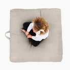 Fog (on sale) / Square@Overhead of kid sitting on Fog Square Floor Cushion