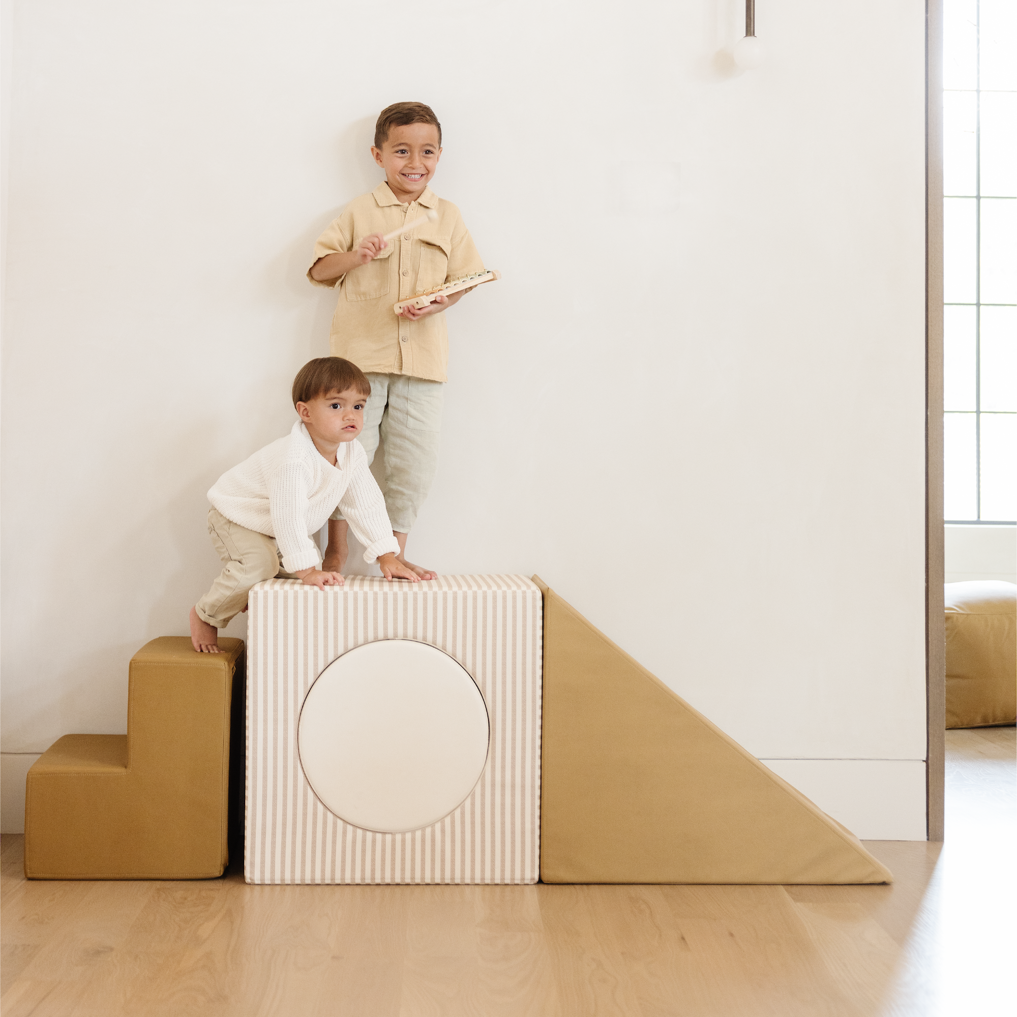 FW23@Boys climbing on FW23 Block Playset
