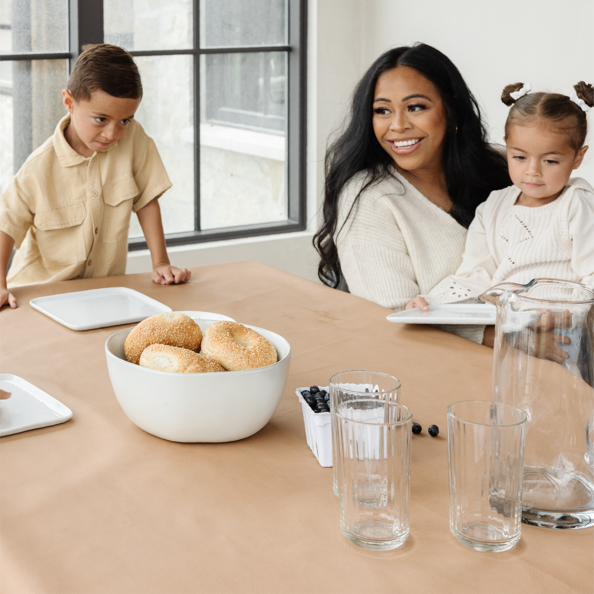 Terra (on sale)@Family sitting at table on Terra Tablecloth