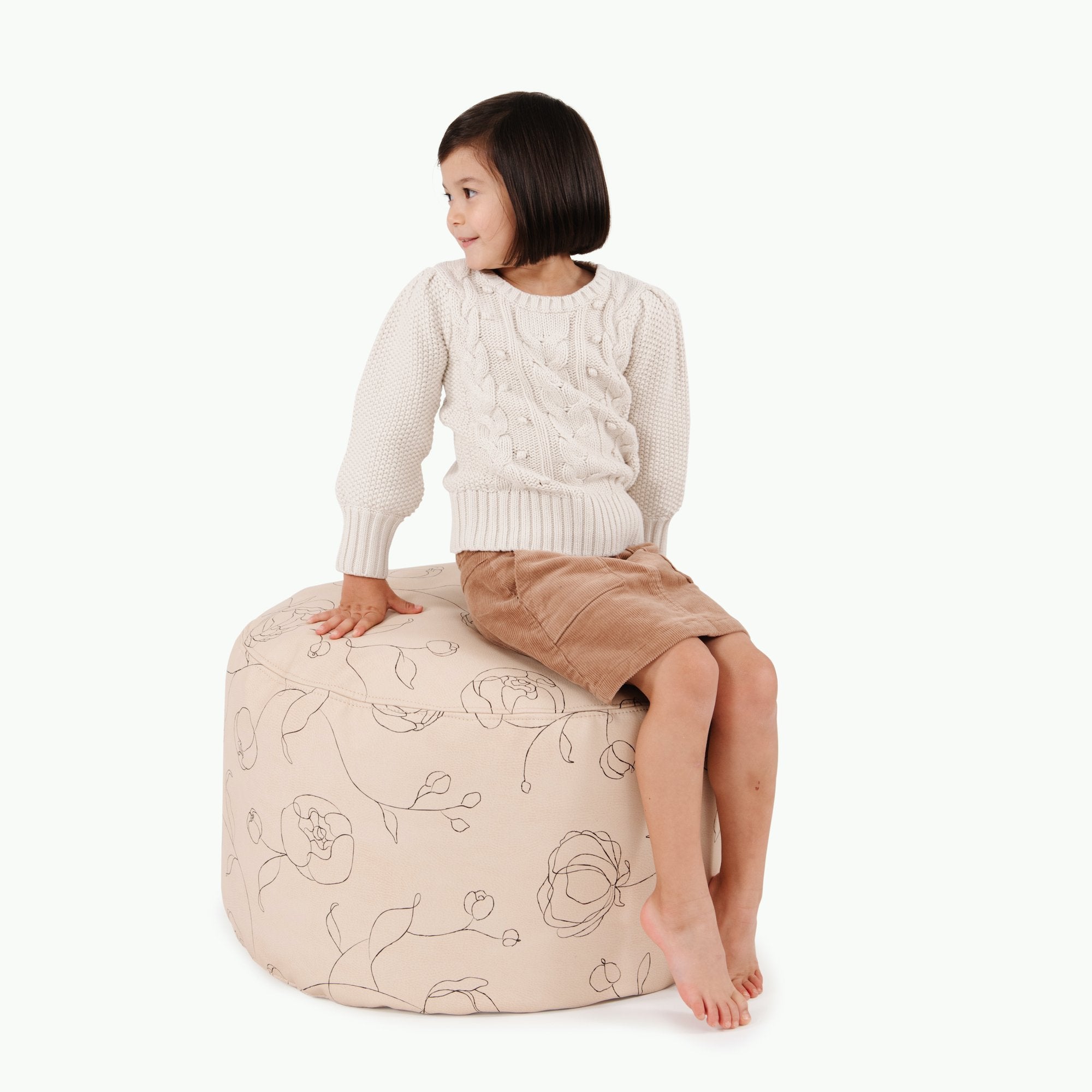 Peony (on sale)@Kid sitting on the Peony Circle Pouf