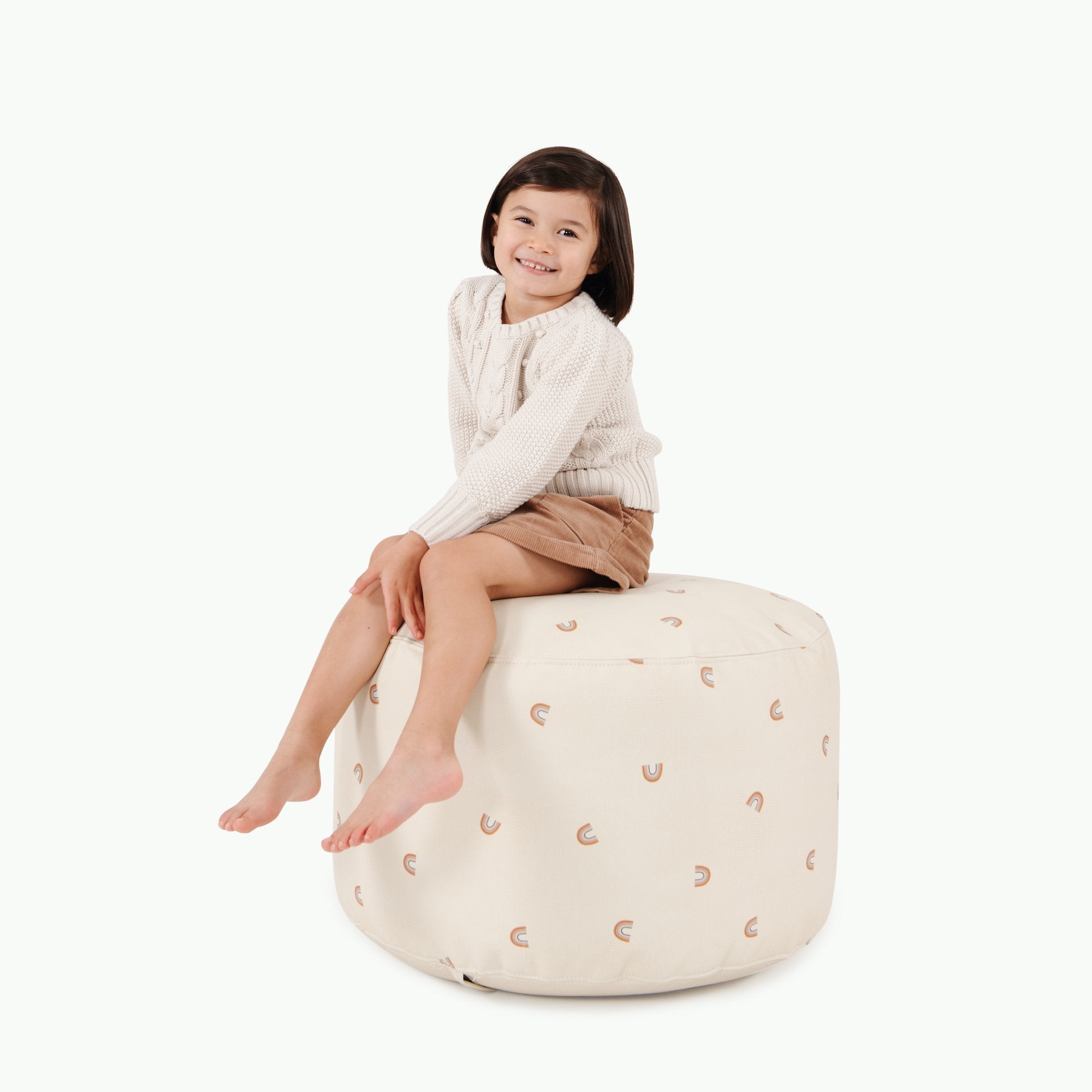 Tiny Rainbow (on sale)@Kid sitting on the Tiny Rainbow Circle Pouf