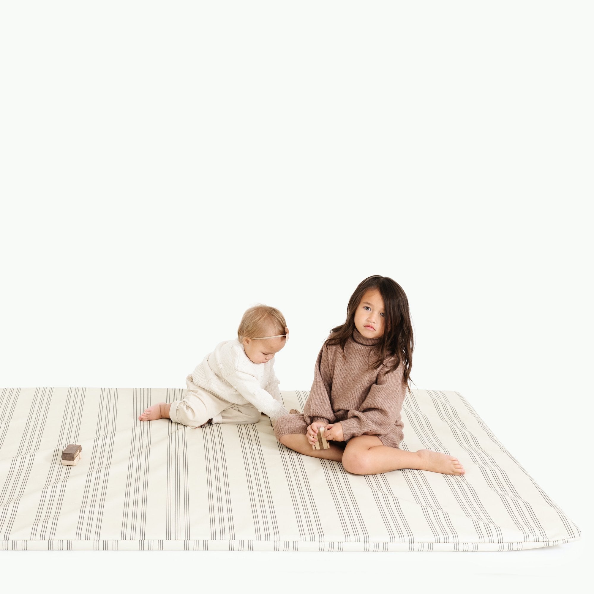 Pencil Stripe (on sale)@kids sitting on pencil stripe padded midi+