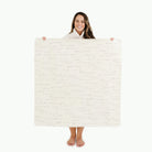Cantata (on sale)@Woman holding the Cantata Mini Mat