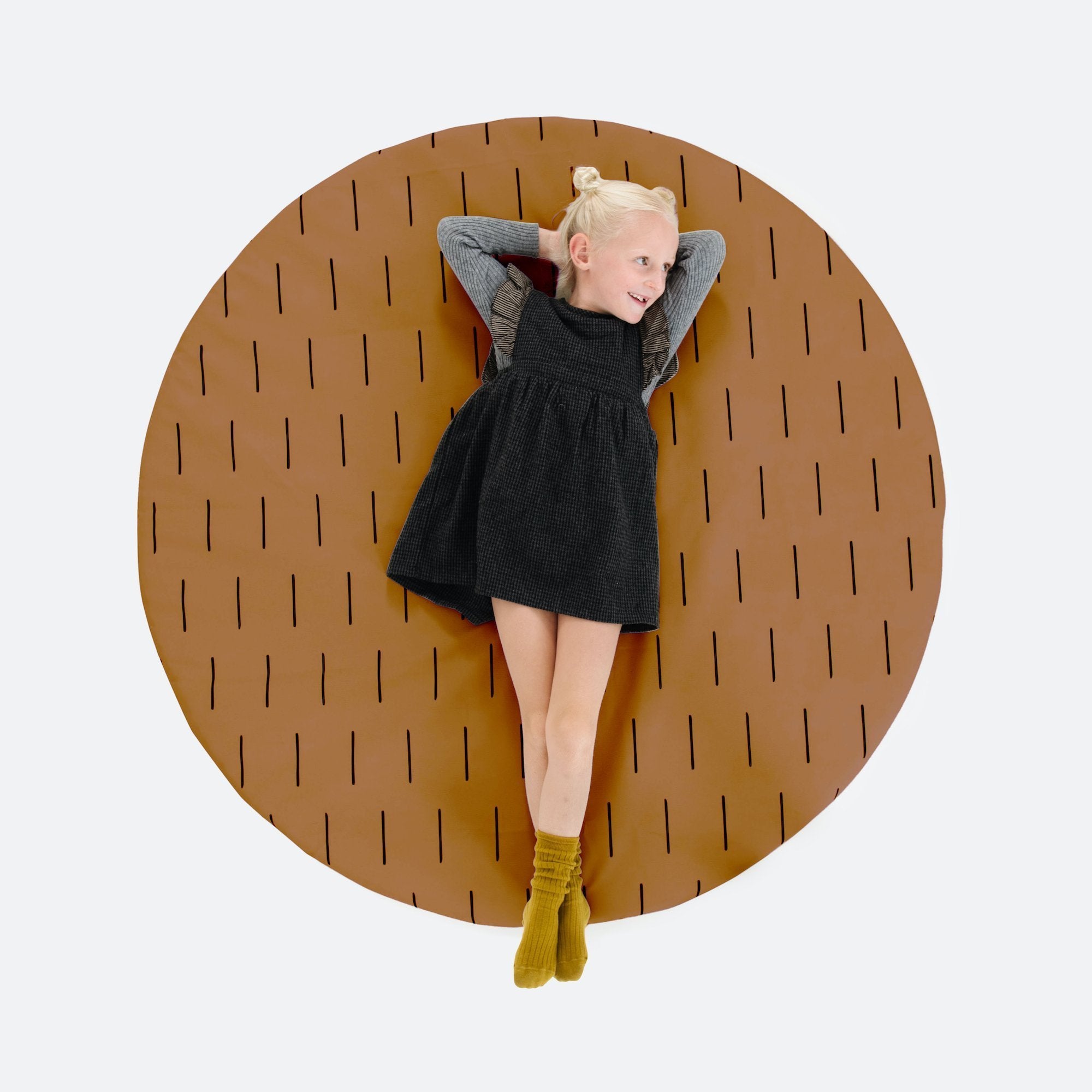 Camel Dash (on sale)@girl laying on camel dash padded midi circle