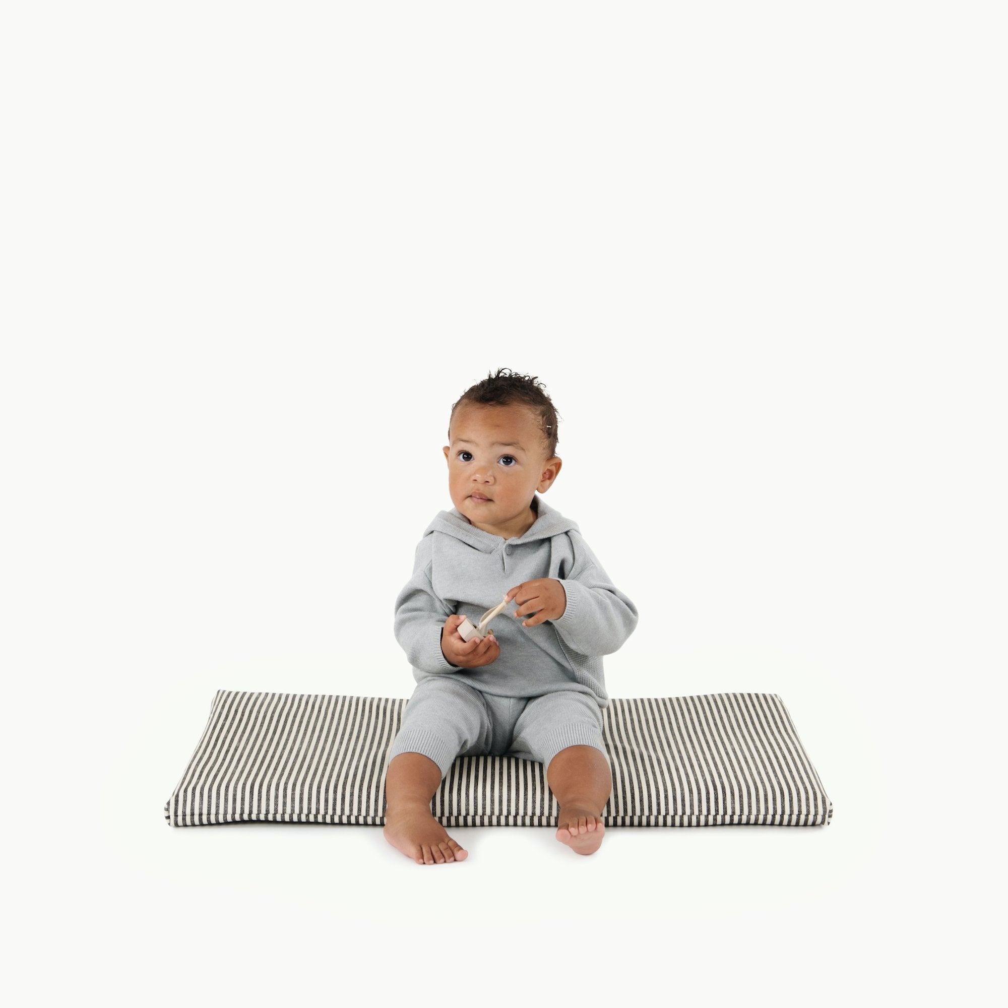 Stone Stripe@kid sitting on Stone Stripe Padded Micro+