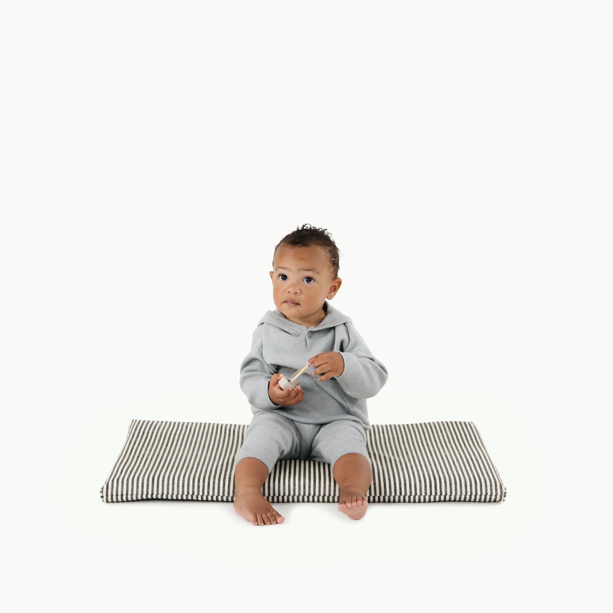 Stone Stripe@kid sitting on Stone Stripe Padded Micro+