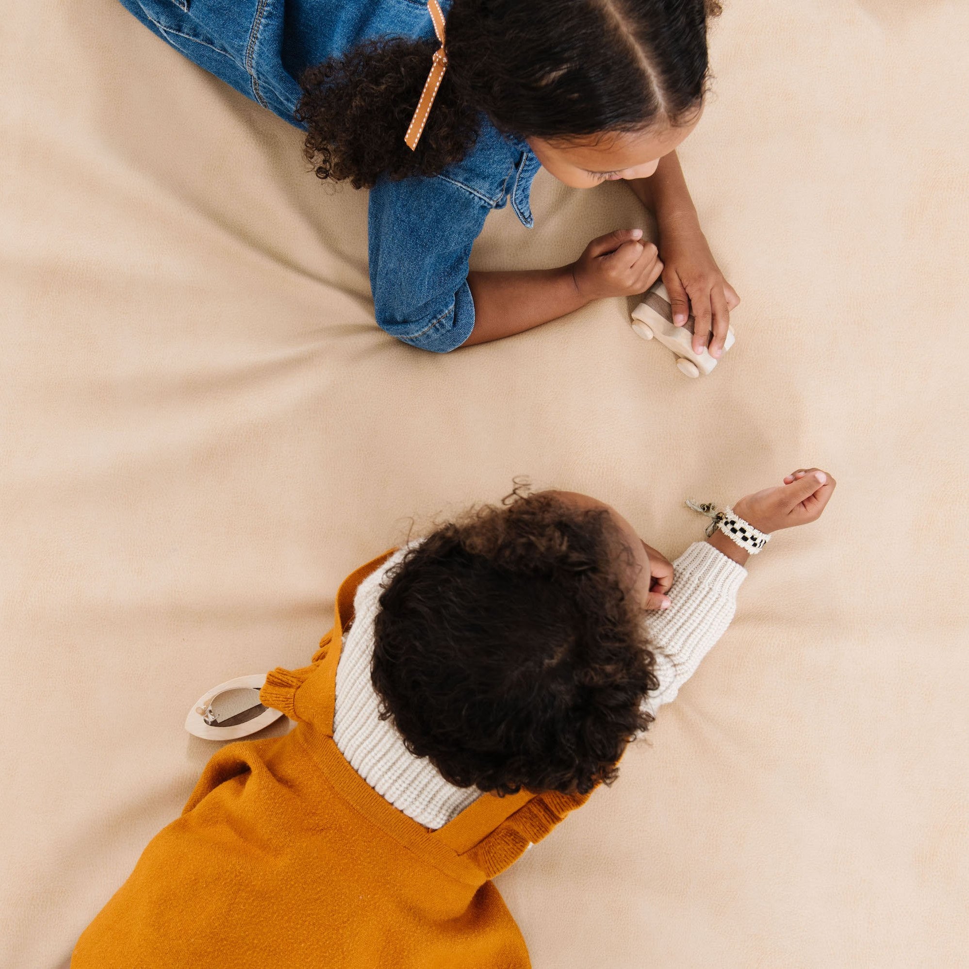 Untanned (on sale)@Overhead of kids playing on Untanned Padded Midi+