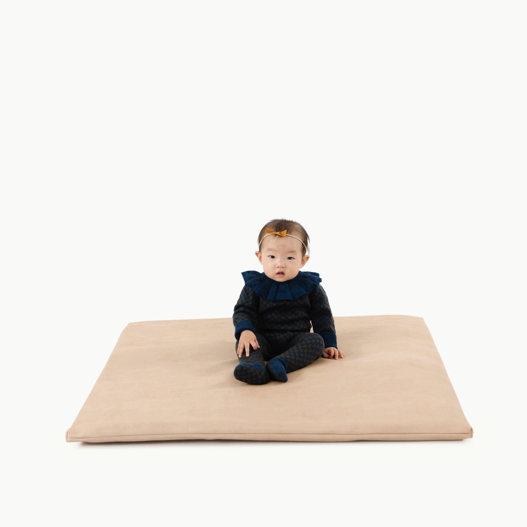 Untanned (on sale) / Square@Baby sitting on Untanned Padded Mini Square