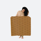 Camel Dash (on sale)@Woman holding the Camel Dash Mini Mat
