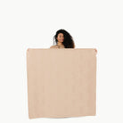 Untanned (on sale) / Square@Woman holding the Untanned Midi Square Mat