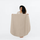 Ember (on sale) / Circle@Woman holding the Ember Circle Midi Mat