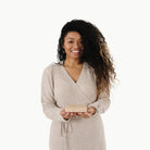 Untanned (on sale)@Woman holding a folded Untanned Micro+ Mat