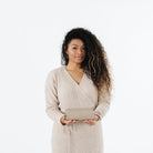 Ember (on sale)@Woman holding a folded Ember Mini Mat