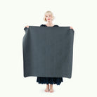 Nightfall (on sale)@Woman holding the Nightfall Mini Mat
