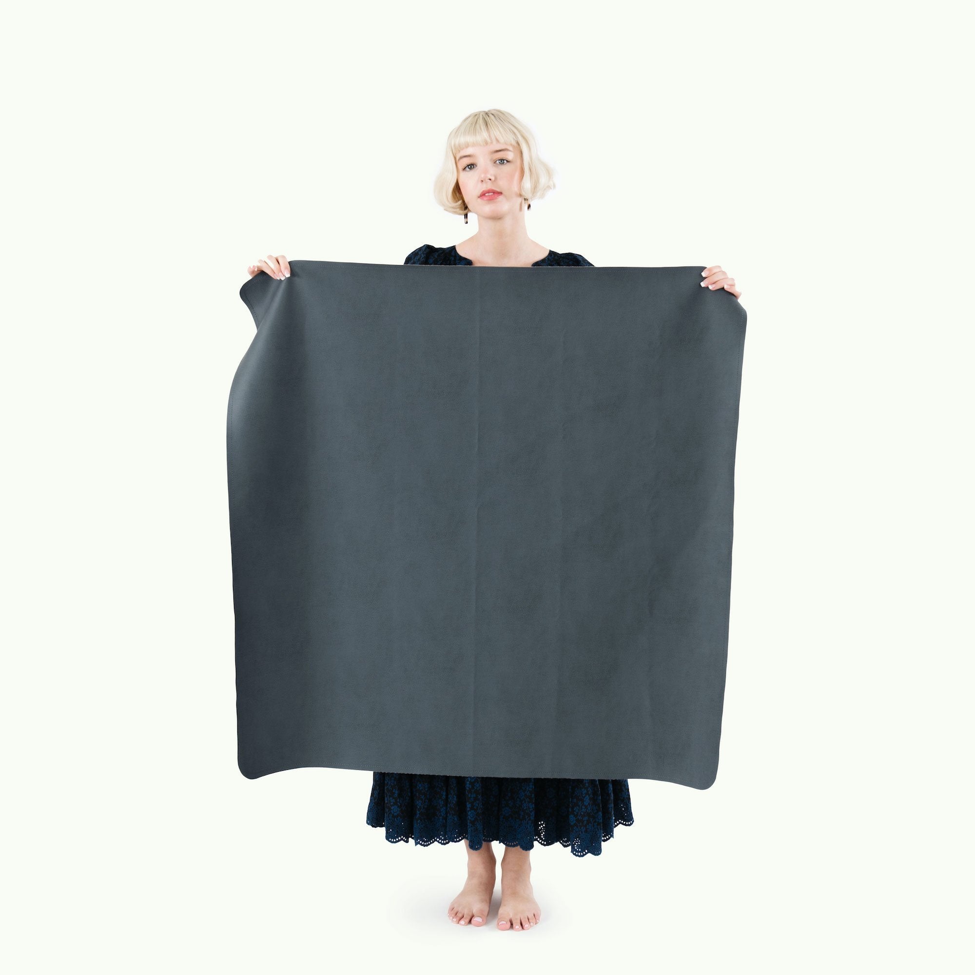 Nightfall (on sale)@Woman holding the Nightfall Mini Mat