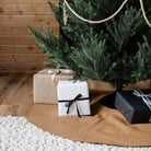 Camel (on sale)@camel tree skirt under christmas tree with presents on top