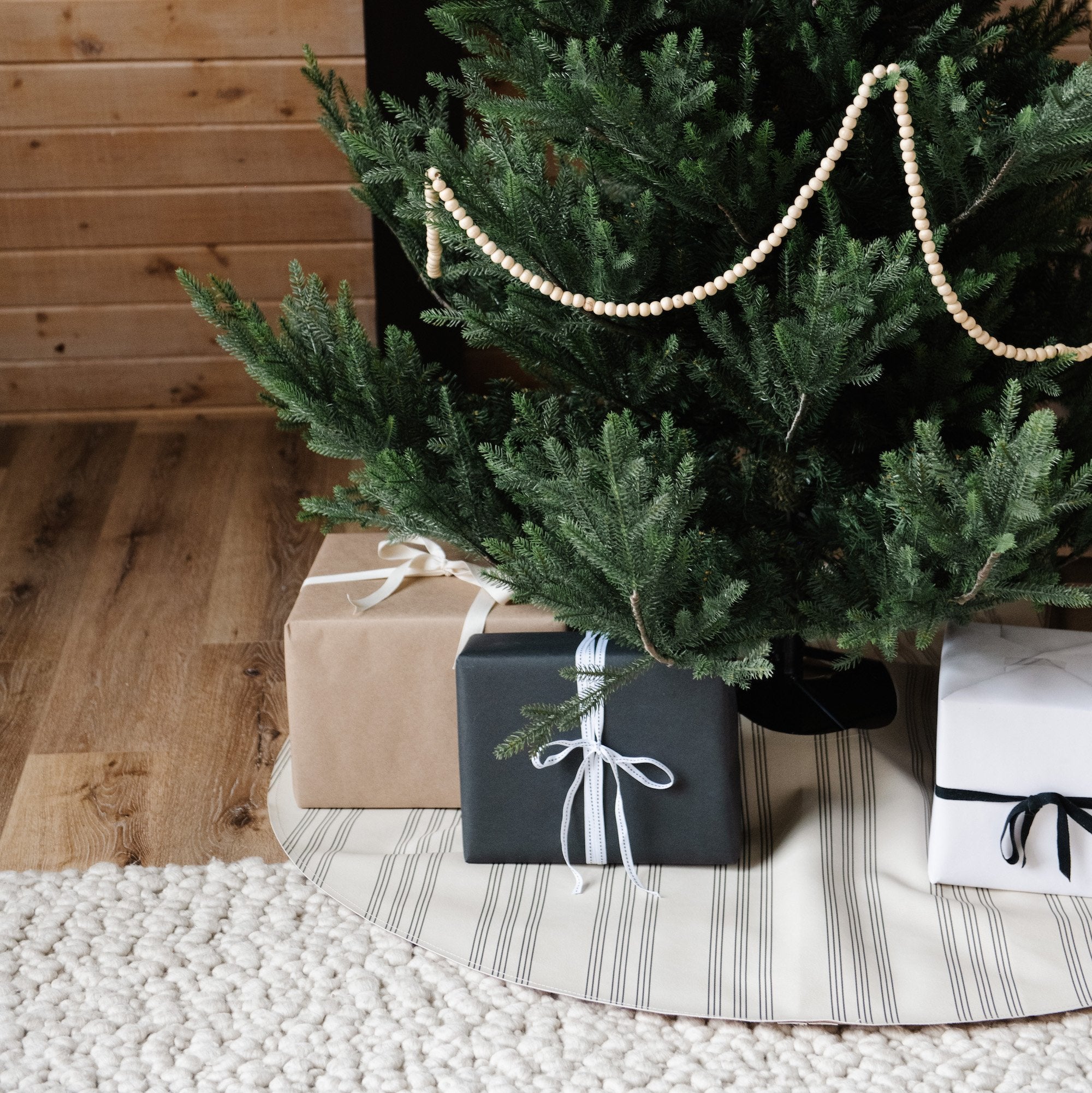 Pencil Stripe (on sale)@Pencil Stripe Tree Skirt under tree