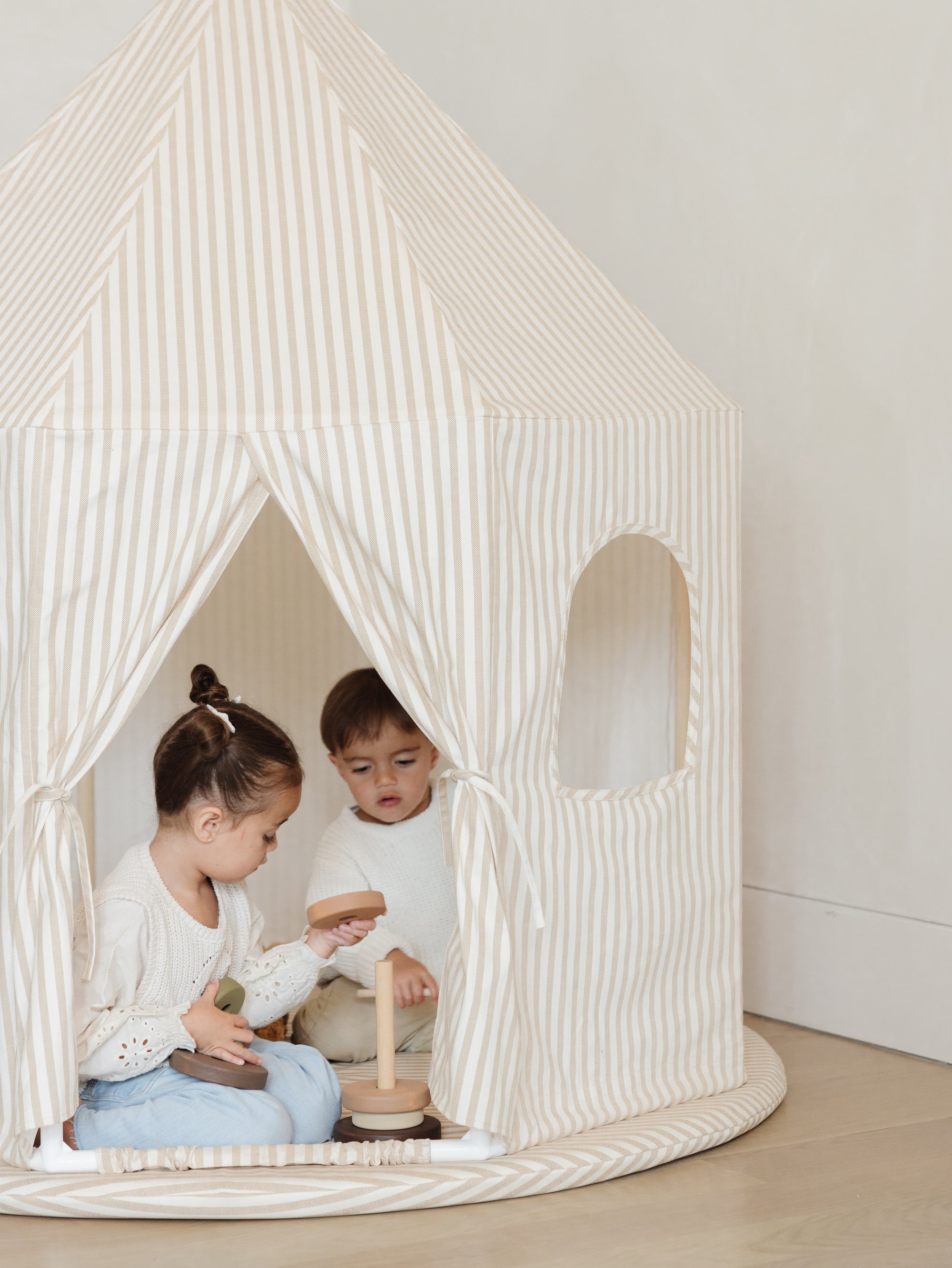 Kids playing in the Play Tent.