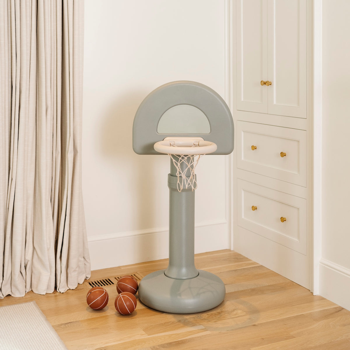Palm@Modern basketball hoop for toddlers styled in a home play space