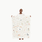 Boulevard@Woman holding the Boulevard Mini+ Mat