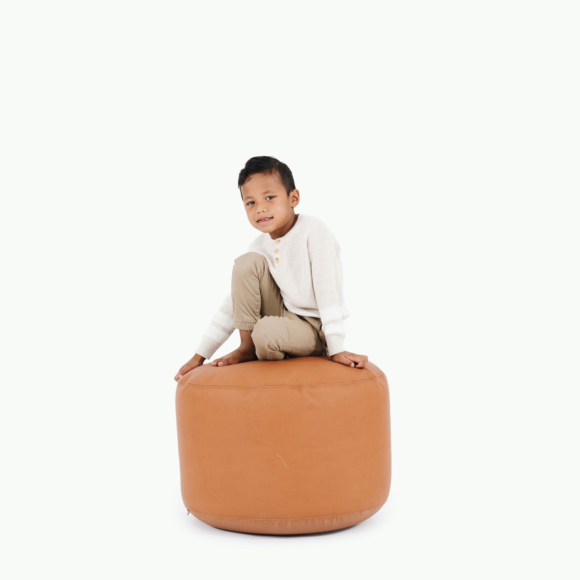 Ginger (on sale)@Kid sitting on the Ginger Circle Pouf