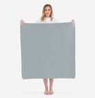 Heron (on sale)@Woman holding the Heron Mini Mat