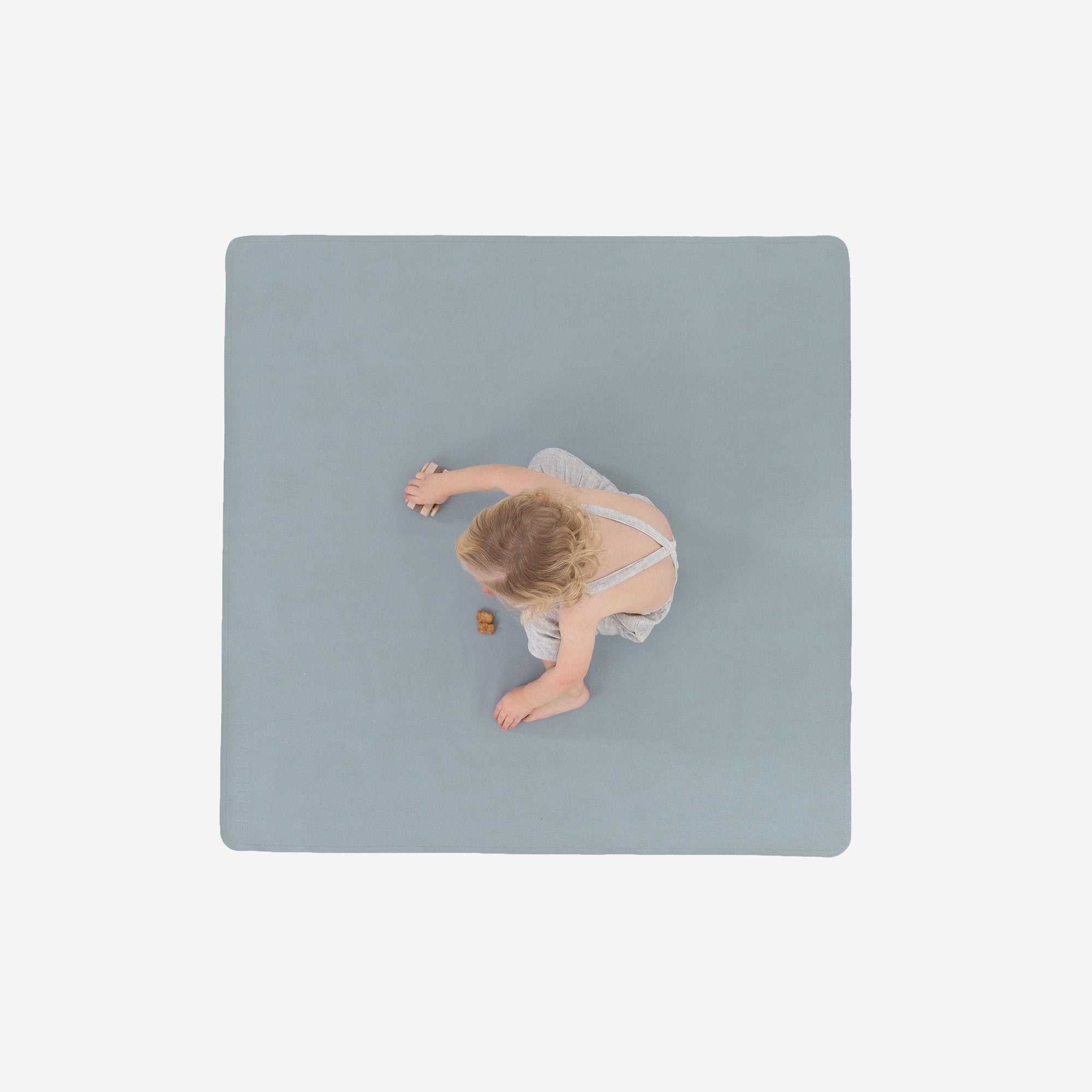 Heron (on sale)@Overhead of kid playing on the Heron Mini Mat