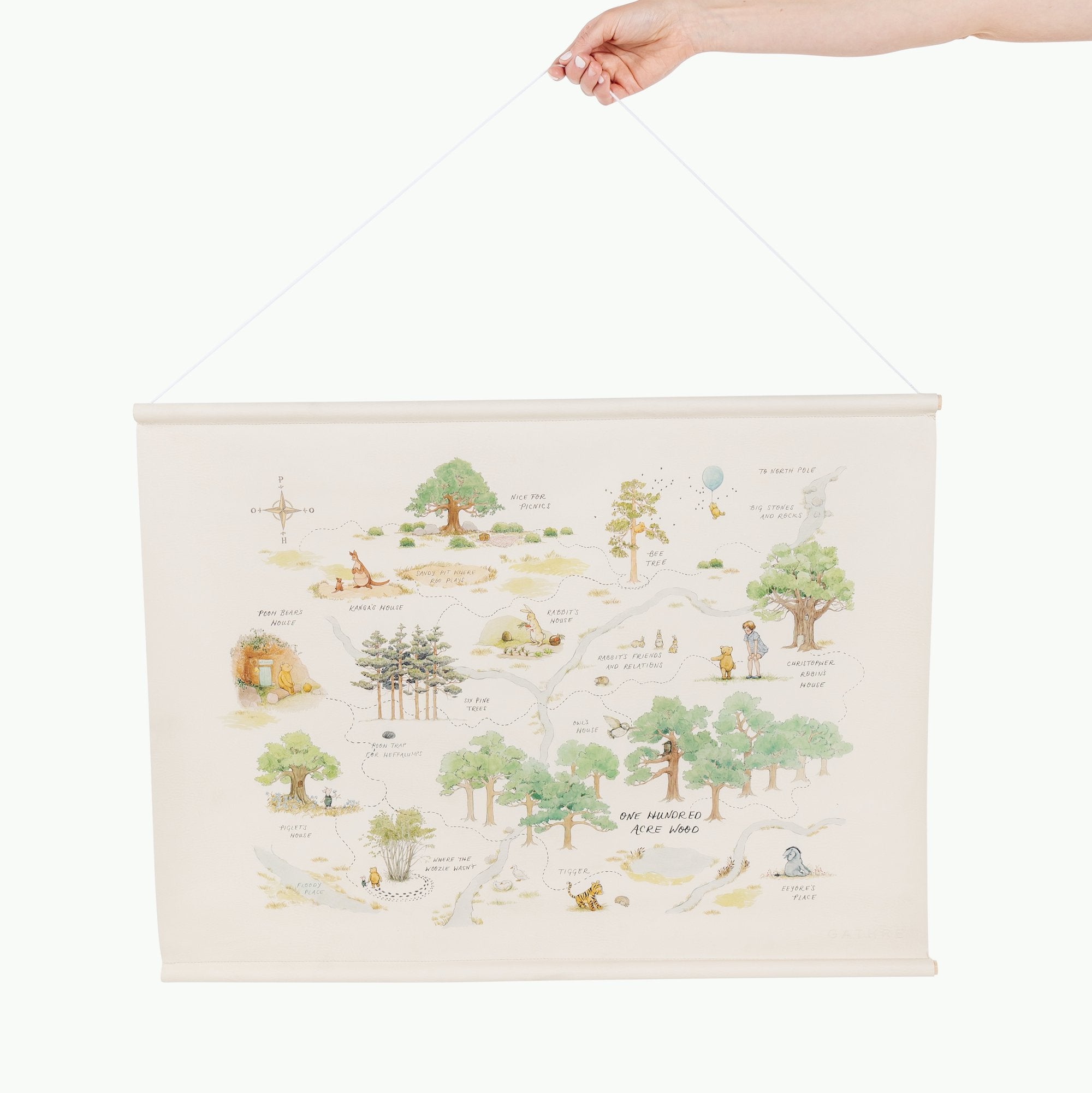 Hundred Acre Wood (on sale)@Woman holding the Hundred Acre Wood Poster