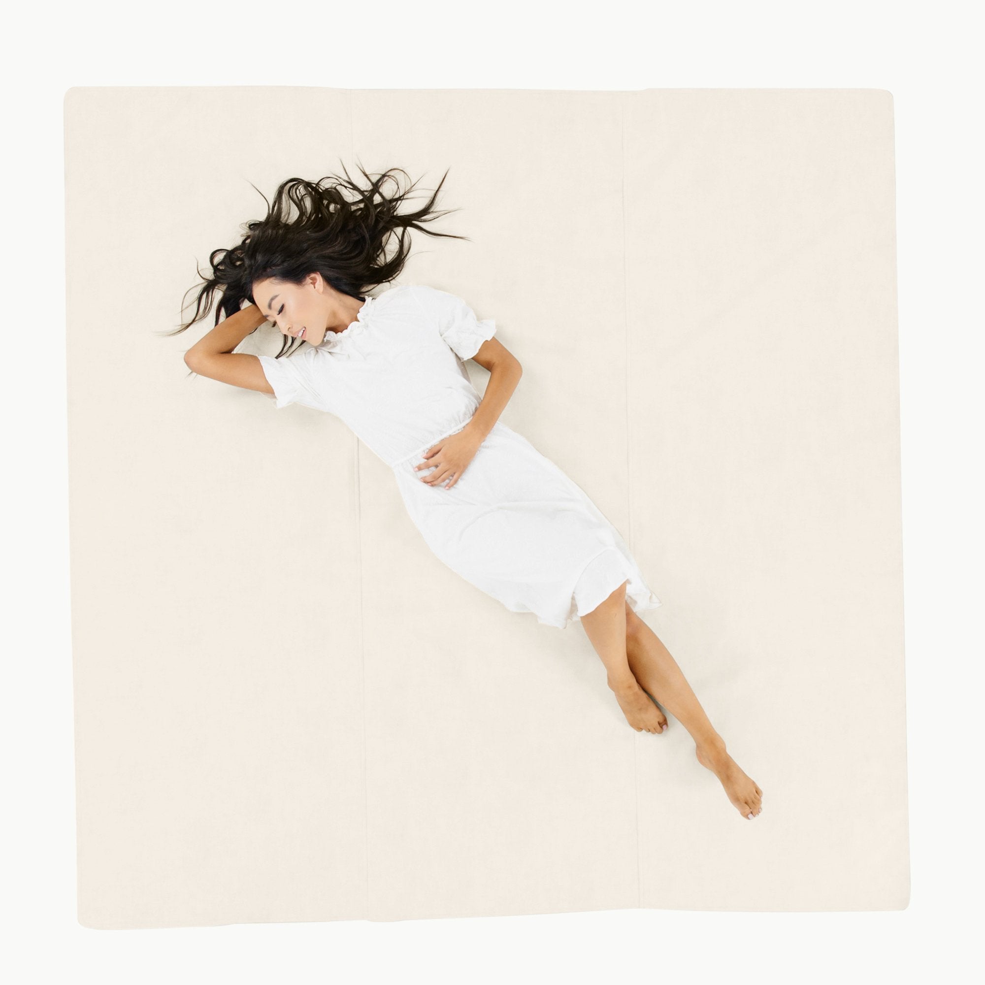 Ivory / Square@Overhead woman sitting on the Ivory Maxi Square Mat