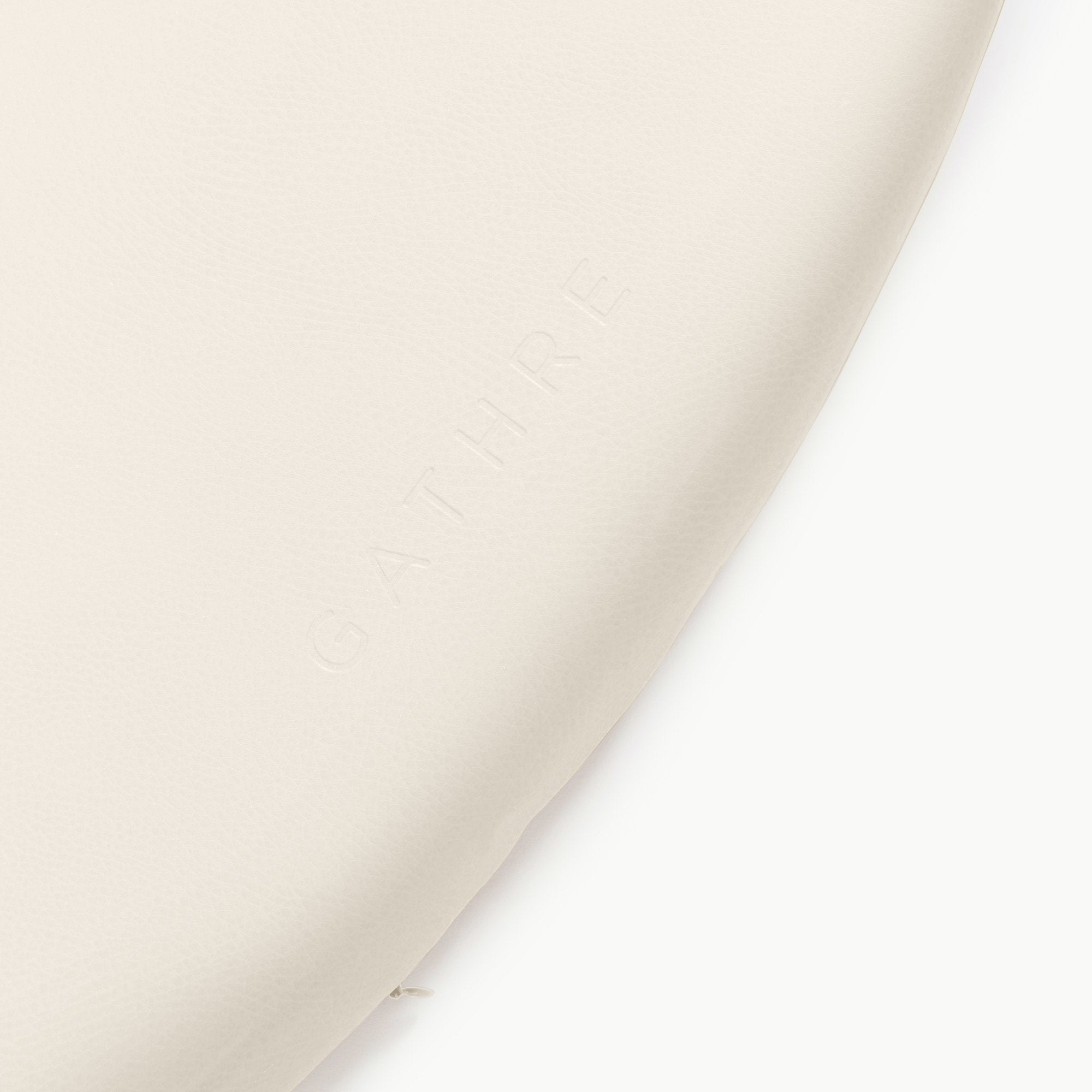 Ivory@close up of ivory padded midi circle