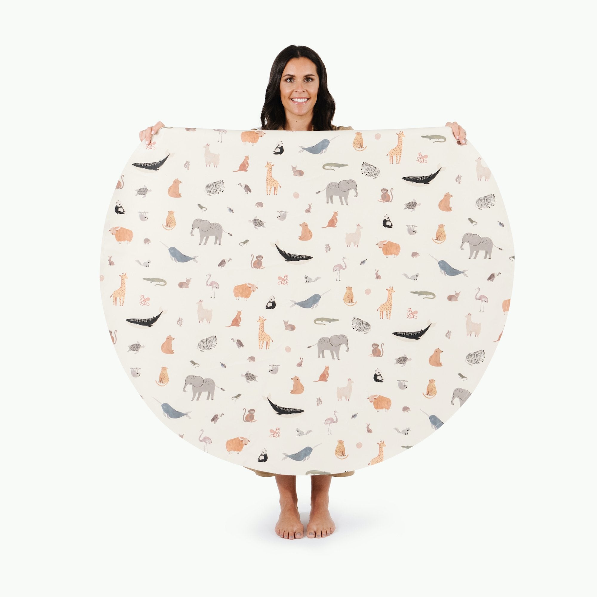 Menagerie / Circle@Woman holding the Menagerie Midi Circle Mat
