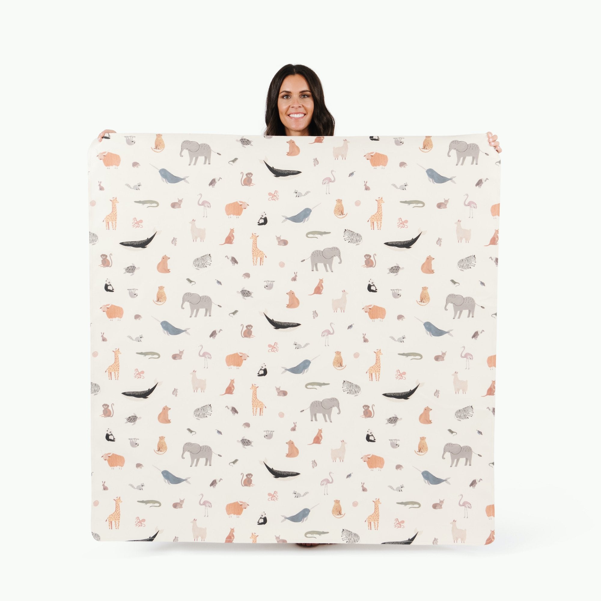 Menagerie / Square@Woman holding the Menagerie Midi Square Mat