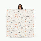 Menagerie / Square@Woman holding the Menagerie Midi Square Mat