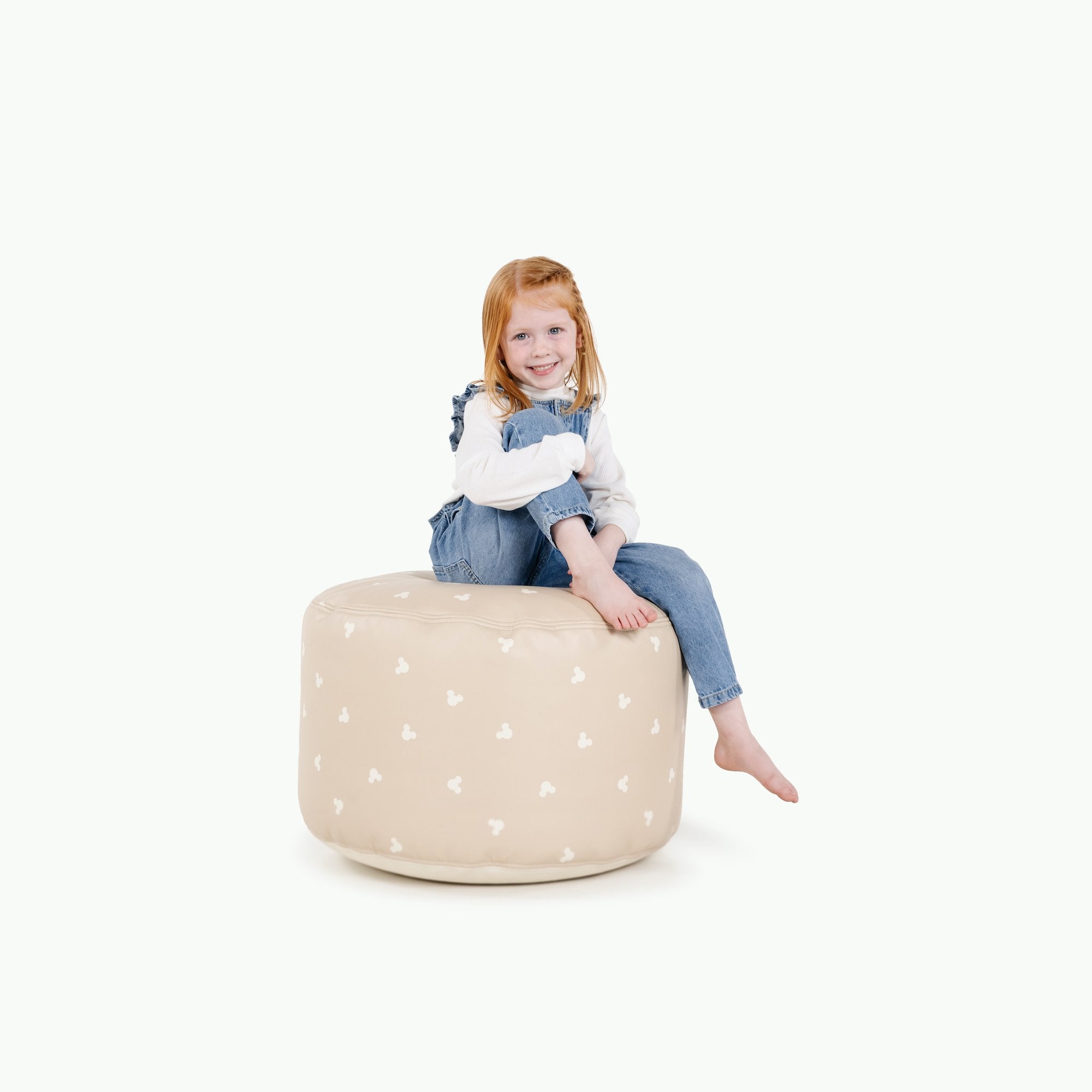 Mickey Mouse (on sale)@Kid sitting on the Mickey Mouse Circle Pouf