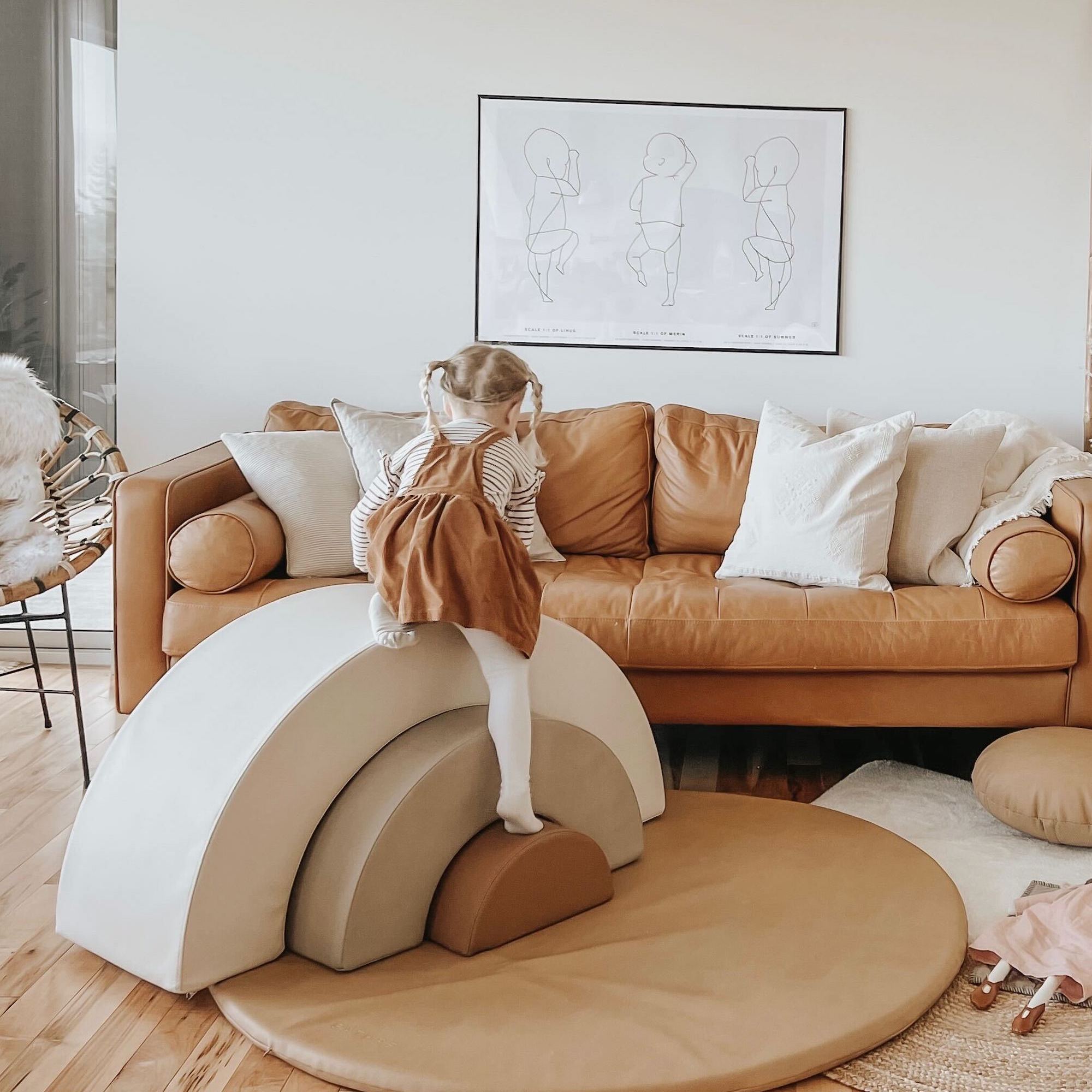 Ivory • Millet • Camel@Kid playing on a Millet Arc Playset in a living room