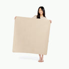 Millet@Woman holding the Millet Mini Mat