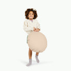 Millet / Circle@Kid holding Millet Mini Circle Floor Cushion