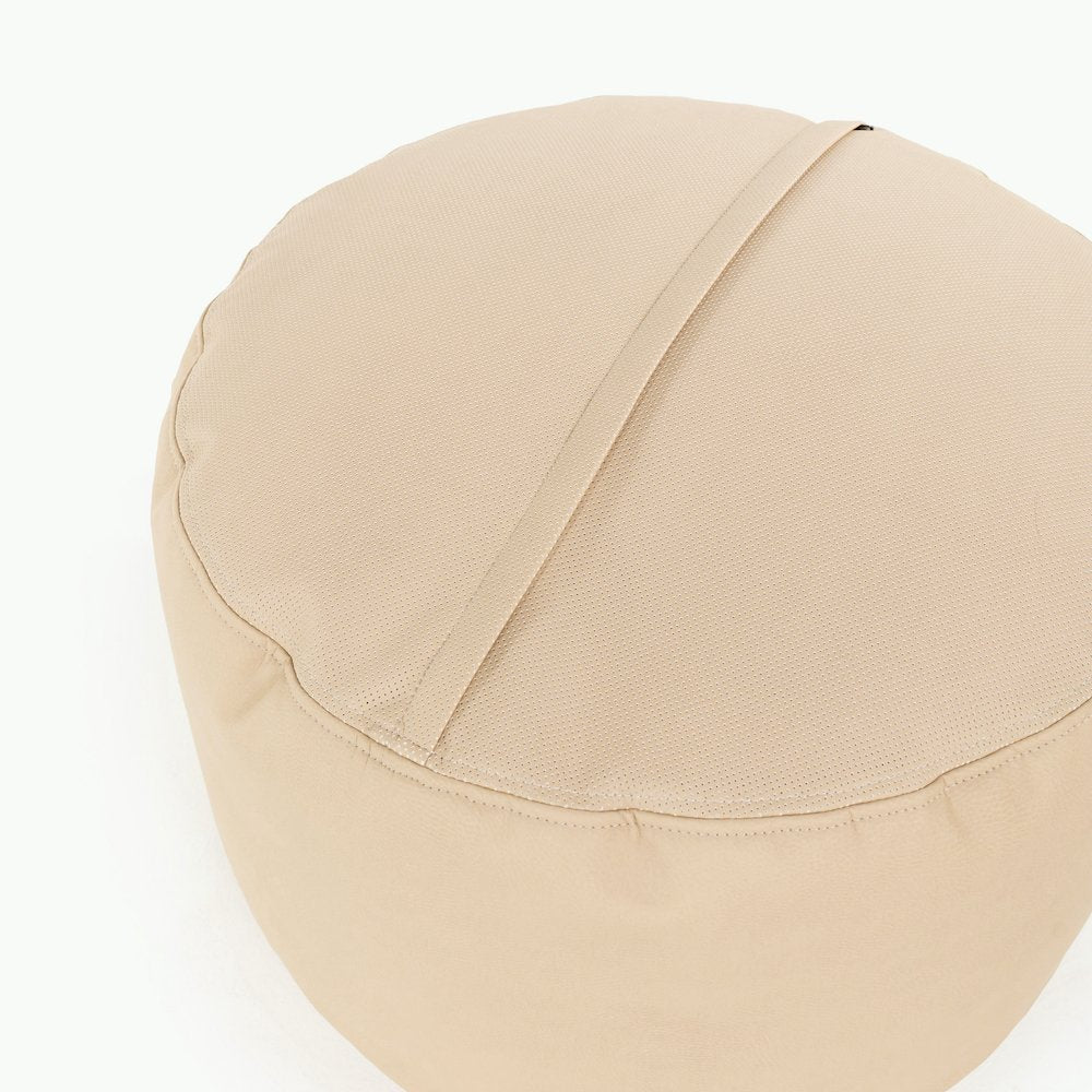 Millet@Detail shot of perforated side of Millet Circle Pouf