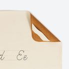 Cursive (on sale)@Hanging tab on the Cursive Micro Mat