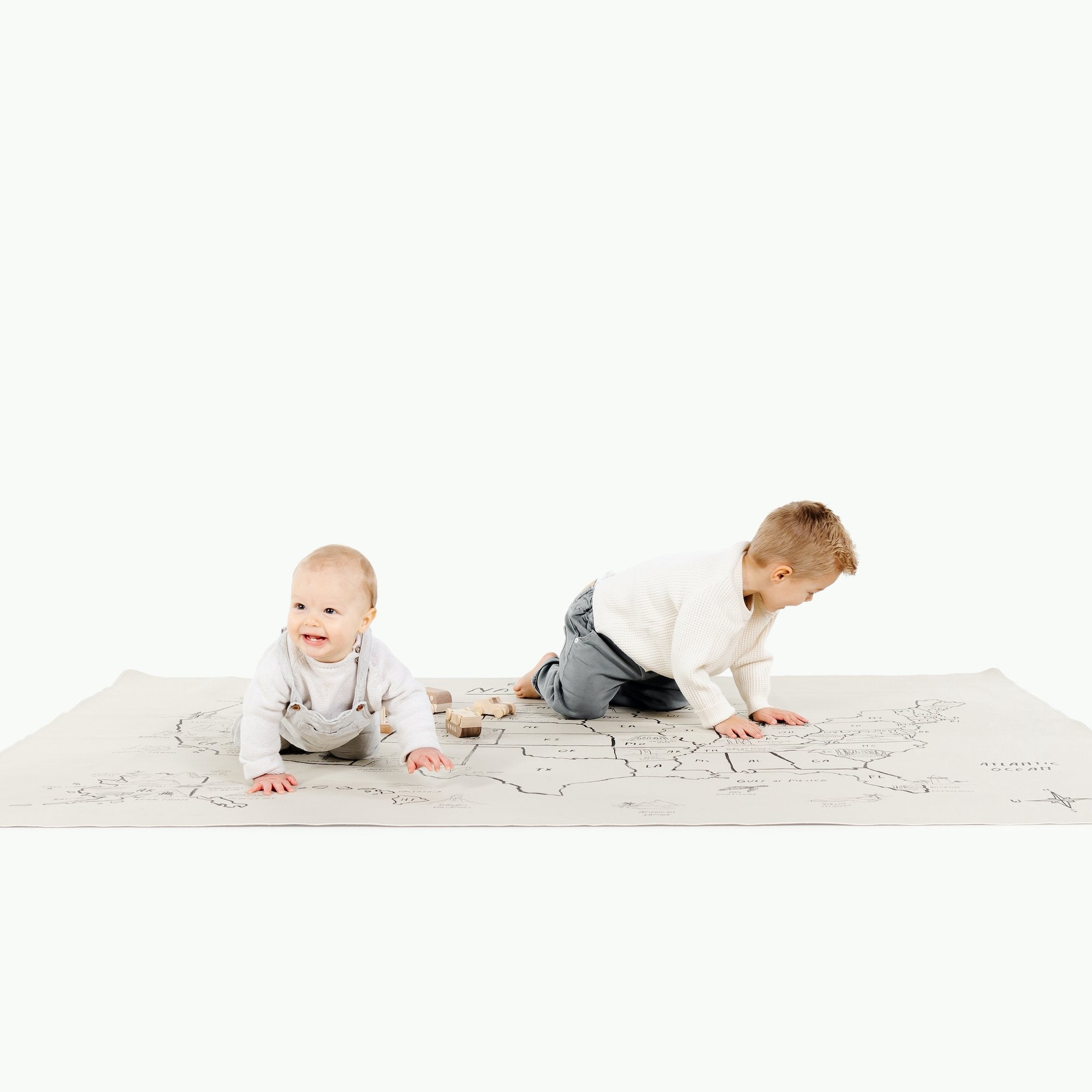 National Parks (on sale)@Kid sitting on the National Parks Midi+ Mat