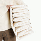 Parchment@Woman holding the folded up Parchment Ball Pit