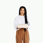 Pebble (on sale) / 6 Foot@woman holding folded pebble tablecloth