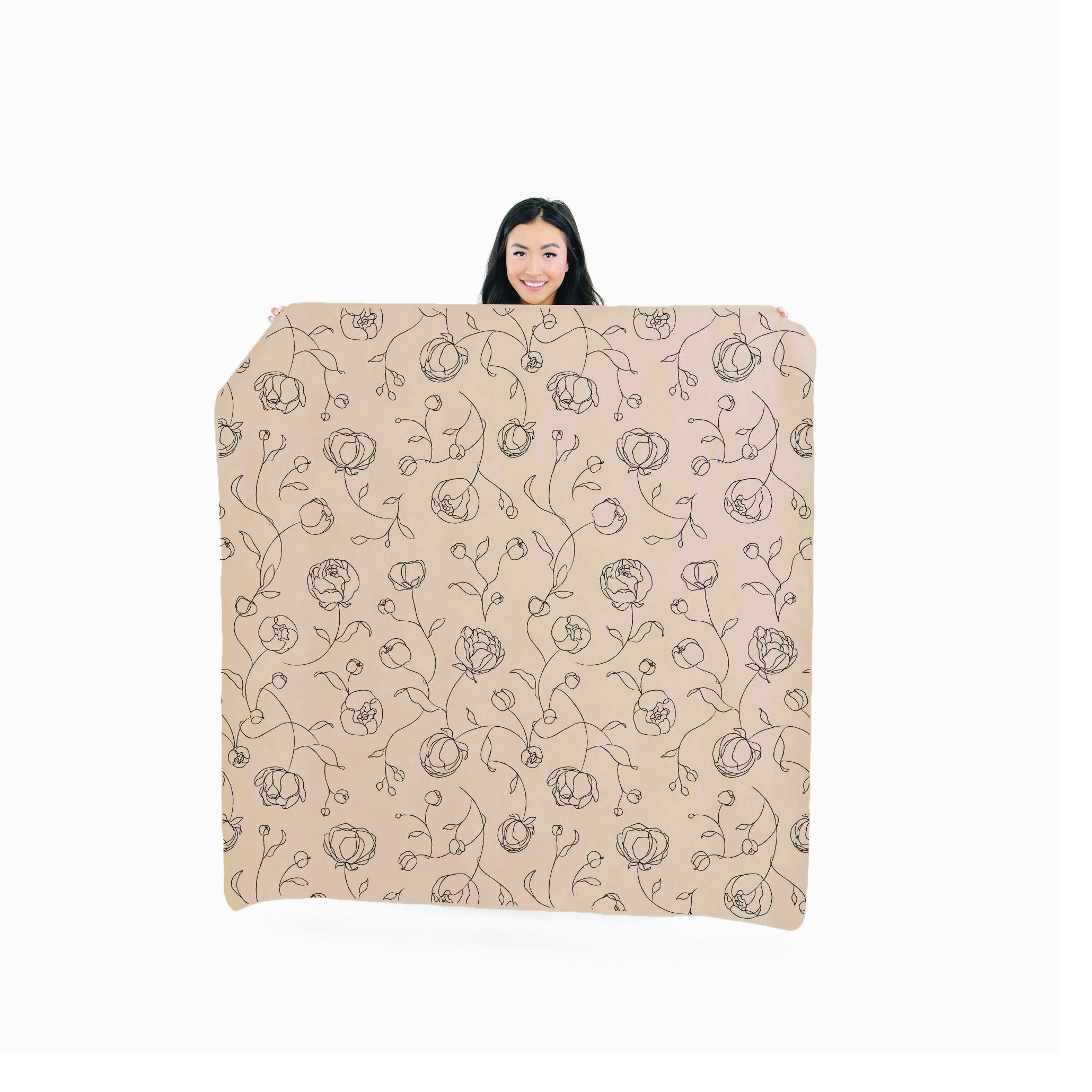 Peony (on sale) / Square@woman holding up the sienna midi circle mat
