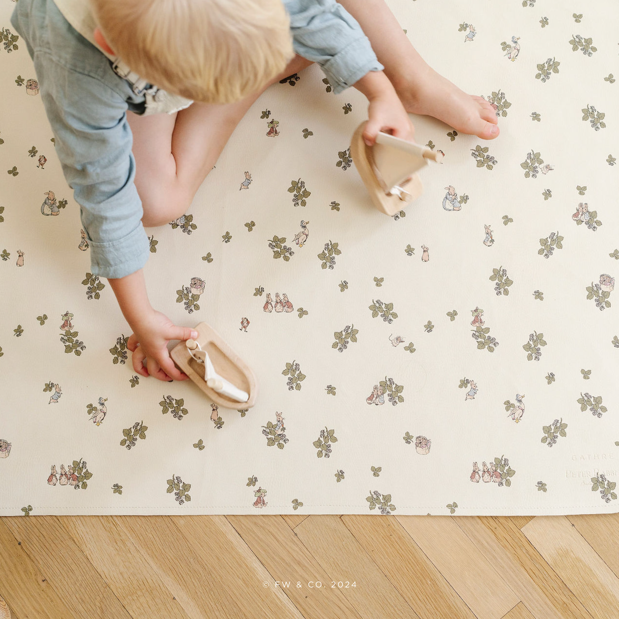 Peter Rabbit™ (on sale) @lifestyle image of little kids playing on a Peter Rabbit™ maxi mat