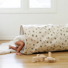 Peter Rabbit™@lifestyle image of a little girl playing in the tunnel
