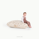 Peter Rabbit™ (on sale) / Square@little boy sitting on square pouf